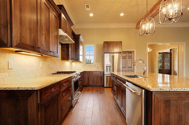 Granite countertops can be found in the upgraded kitchen.
