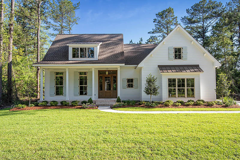 This quaint home is a custom built home built along the Northshore of New Orleans and was part of the 2019 Parade of Homes.