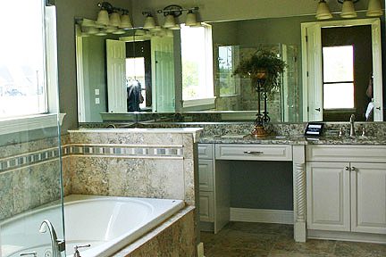 Upgraded master bath with his and her sinks.