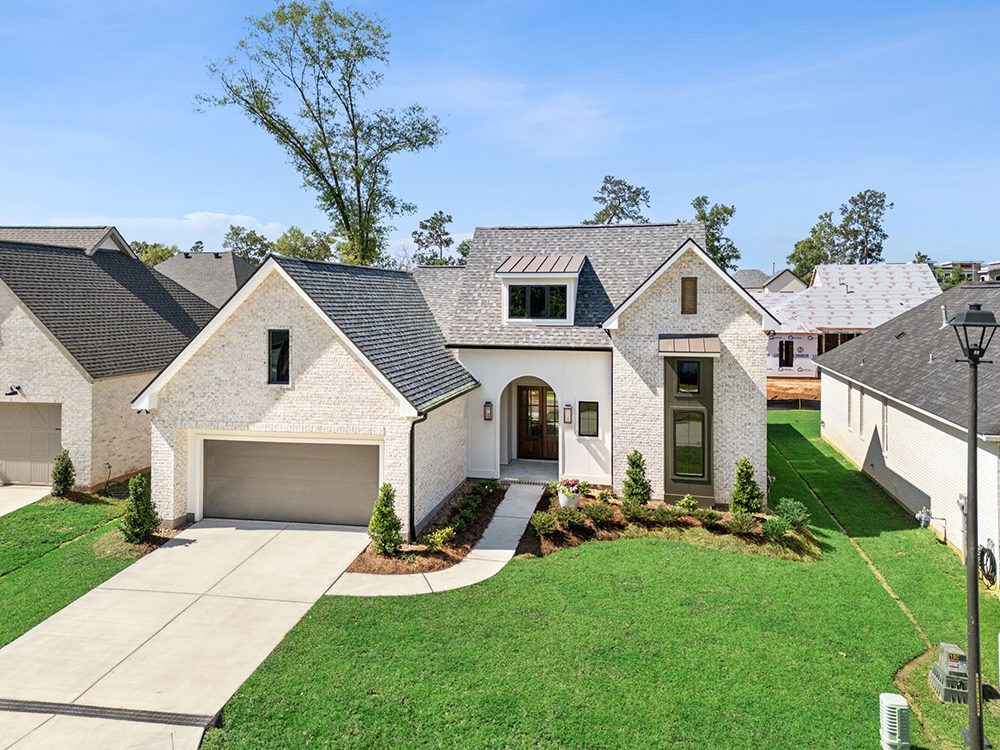 1-5040 Twin River Overview With manicured landscaping, a two-car garage, and a spacious driveway, the home offers both curb appeal and functionality in a beautifully designed neighborhood.