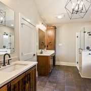A primary bathroom featuring a nice soaking tub and luxurious shower.