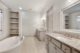 The master bathroom features a nice soaking tub with a dual vanity.