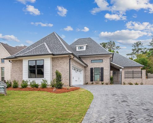 A nice home with a side entry garage and custom brick exterior.
