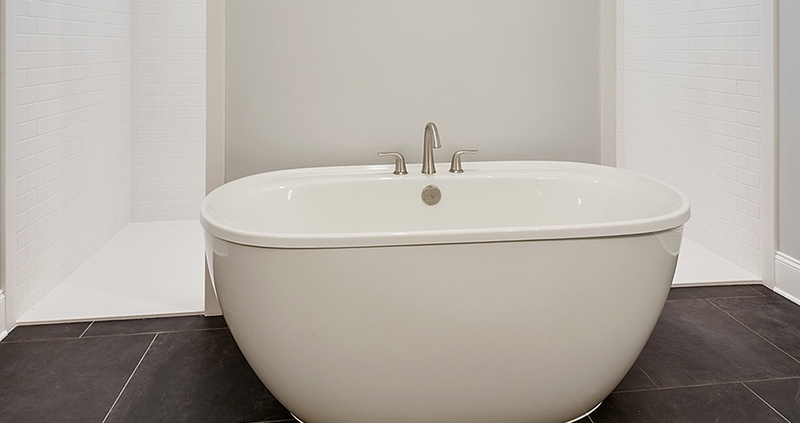 A stand alone tub is the focal point of the master bathroom.