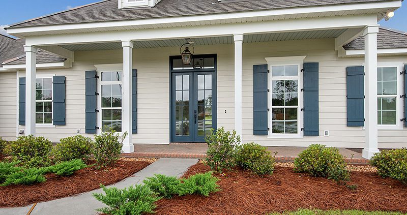 A rocking chair front porch that welcomes you to this home.