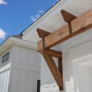 The wood trim above the garage is a custom feature.